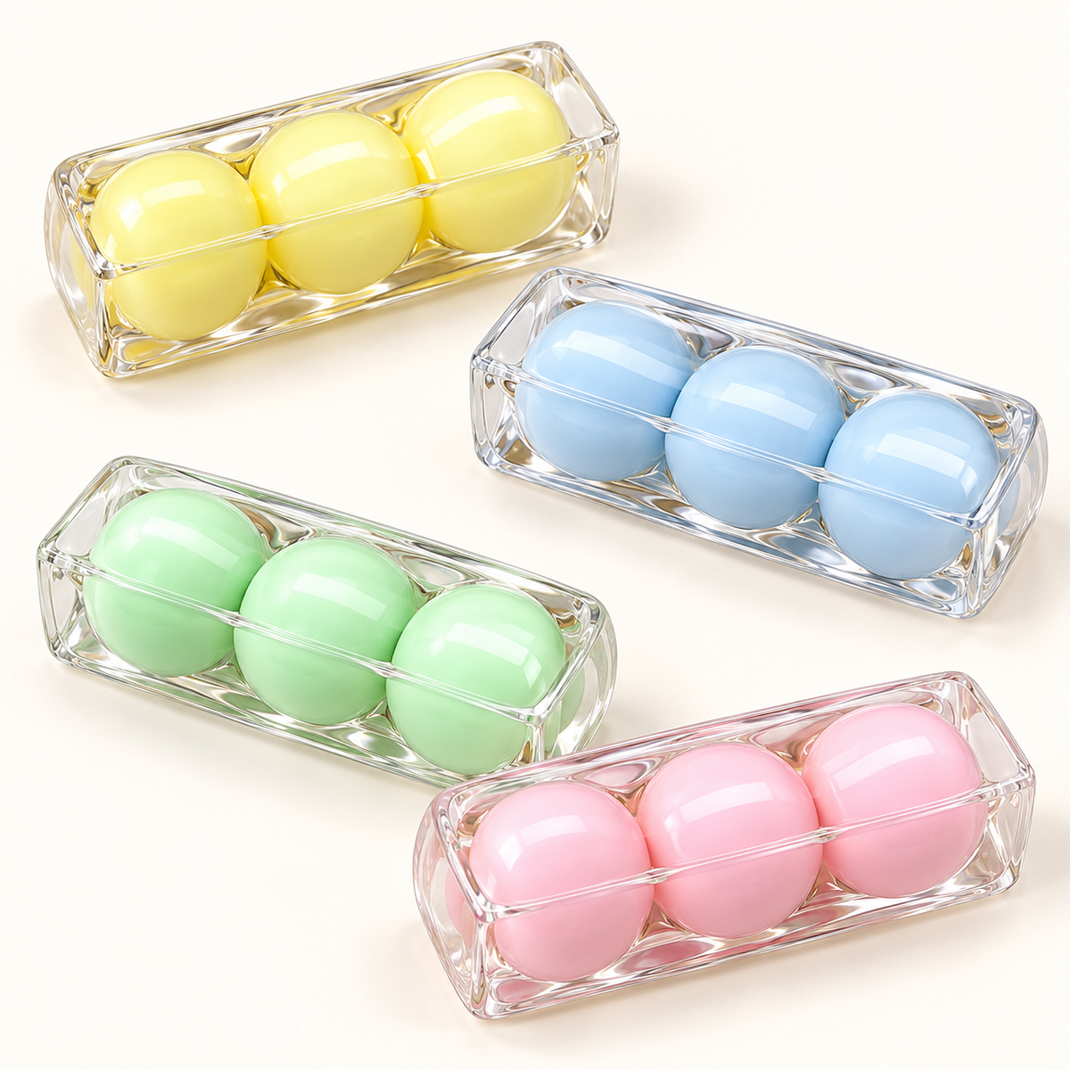 SQUEEZU Tangyuan Butter Stick Squishies in yellow, blue, green and pink, with three rounded sections inside each clear shell.