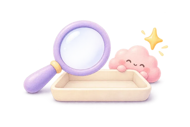 Pastel magnifying glass beside a pink cloud squishy and an empty tray